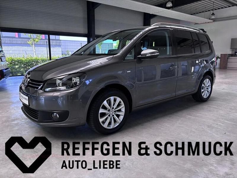 Grau Gebraucht 2014 VW Touran Van / Kleinbus | 20.919 € - Bild 1/4