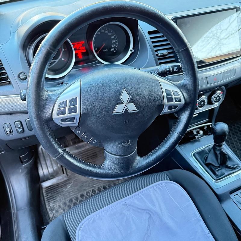 Gebraucht Mitsubishi Lancer 150 PS (110 kW) 2011 Schwarz Limousine