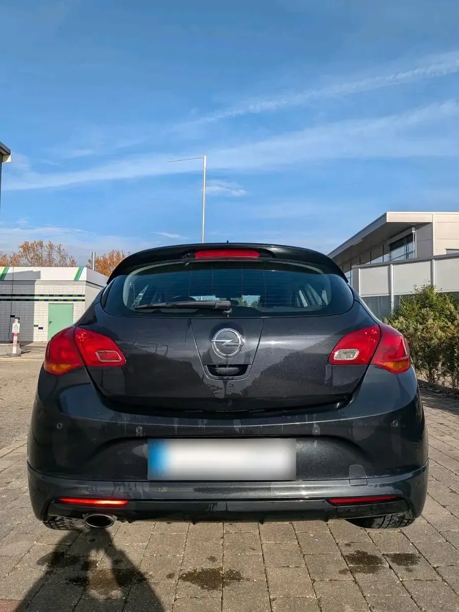 Używany Opel Astra OPC 170 KM (125 kW) 2014 Czarny Sedan/Limuzyna