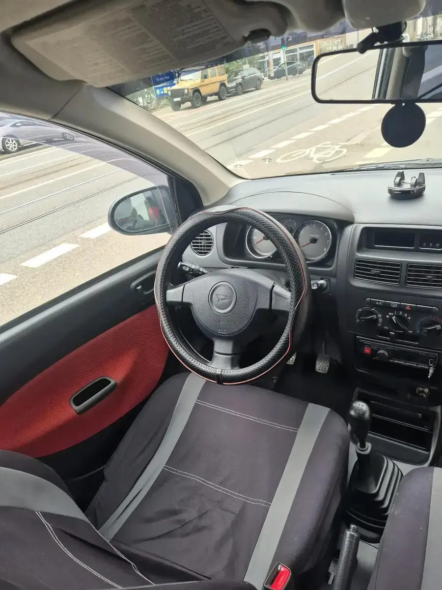 Gebraucht Daihatsu Cuore 58 PS (42 kW) 2006 Silber Kleinwagen