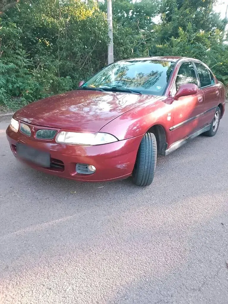 Gebraucht Mitsubishi Carisma 125 PS (91 kW) 1998 Rot Limousine