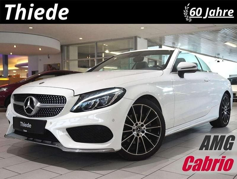 Polarweiss Gebraucht 2018 Mercedes C180 AMG line Cabrio | 26.800 € (Superpreis) - Bild 1/3