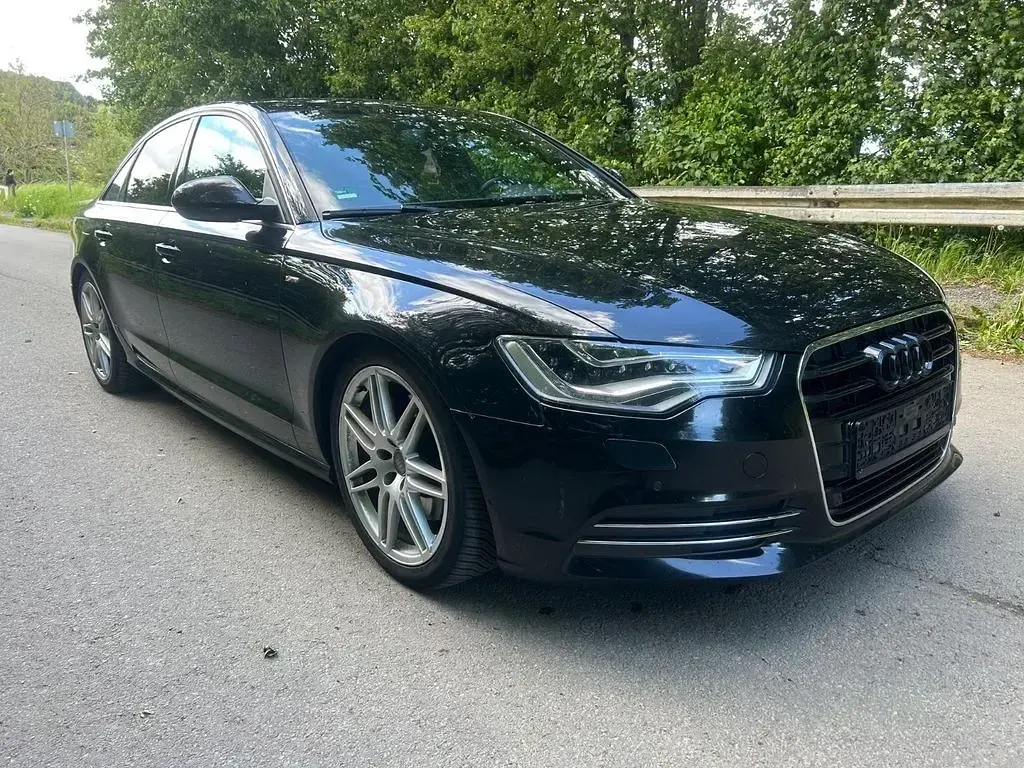 Używany Audi A6 S-Line 245 KM (180 kW) 2014 Czarny Sedan/Limuzyna