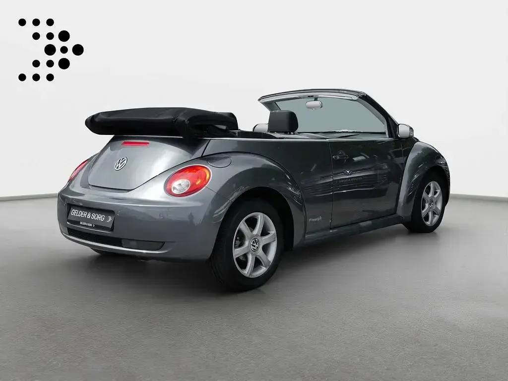 Gebraucht VW New Beetle Cabriolet Freestyle 105 PS (77 kW) 2010 Platinum grey metallic Cabrio