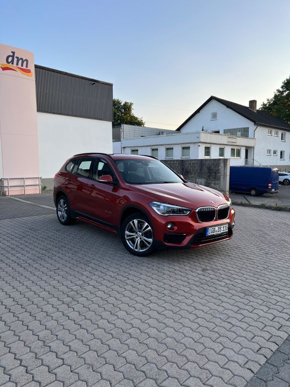 Orange Gebraucht 2017 BMW X1 Sport Line SUV | 17.950 € (Superpreis) - Bild 1/4