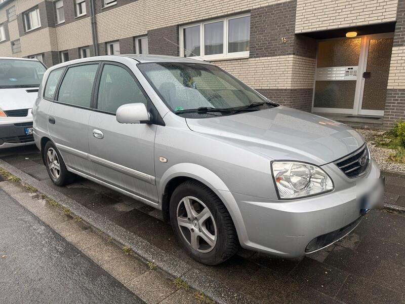 Silber Gebraucht 2006 Kia Carens Van / Kleinbus | 1.111 € (Guter Preis) - Bild 1/4