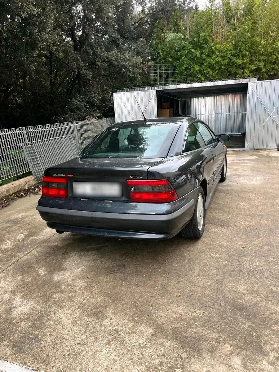 Second-hand Opel Calibra 150 CP (110 kW) 1994 Negru Coupe