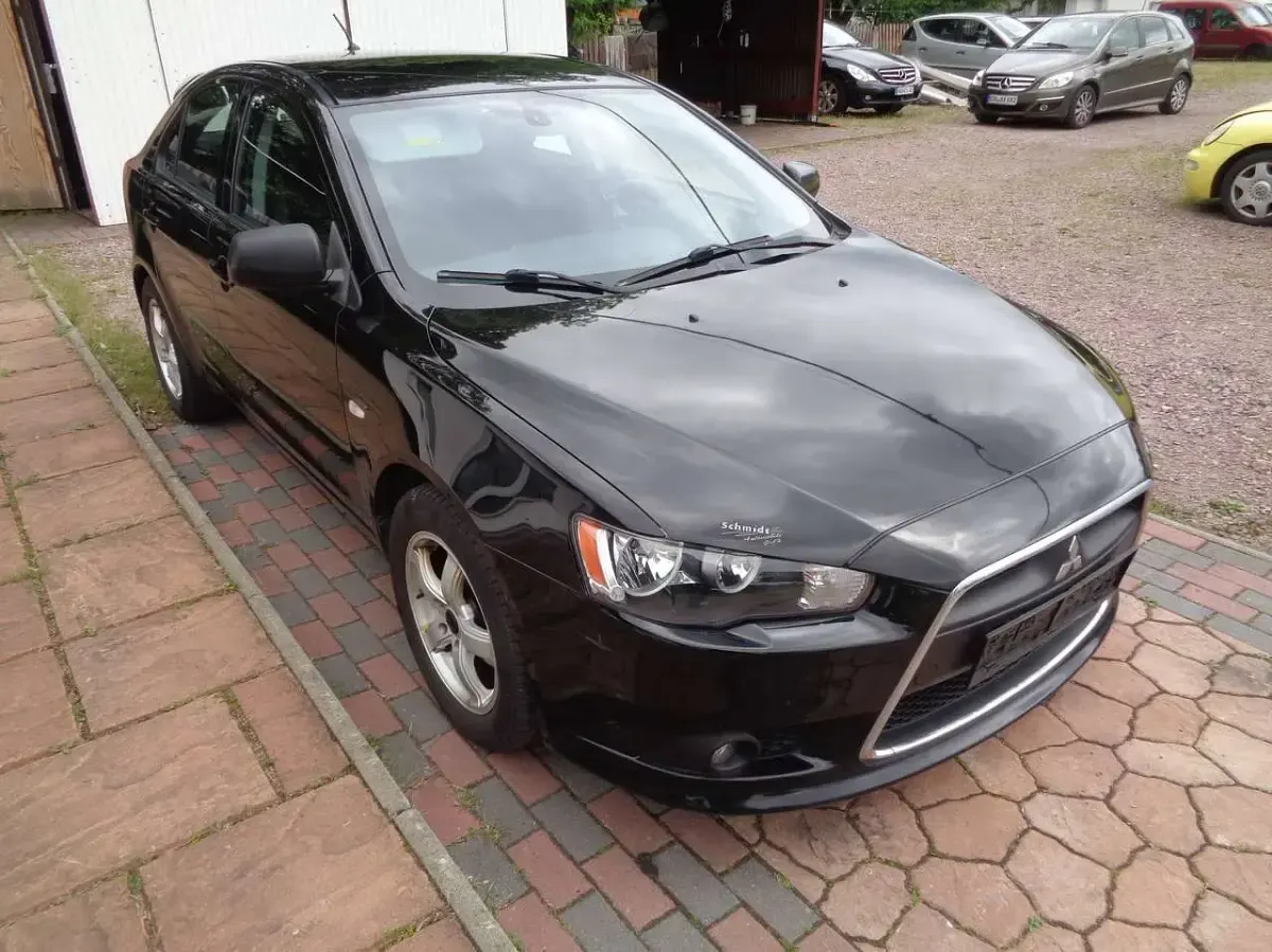 Gebraucht Mitsubishi Lancer 117 PS (86 kW) 2012 Schwarz Limousine