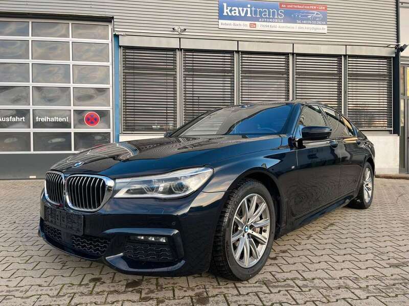 Carbonschwarz metallic Gebraucht 2016 BMW 750L Limousine | 33.000 € (Fairer Preis) - Bild 1/4