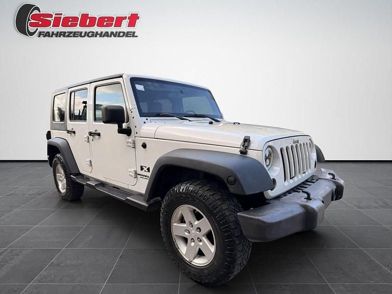 Stone white clear coat Gebraucht 2009 Jeep Wrangler Sport SUV | 18.990 € (Fairer Preis) - Bild 1/4