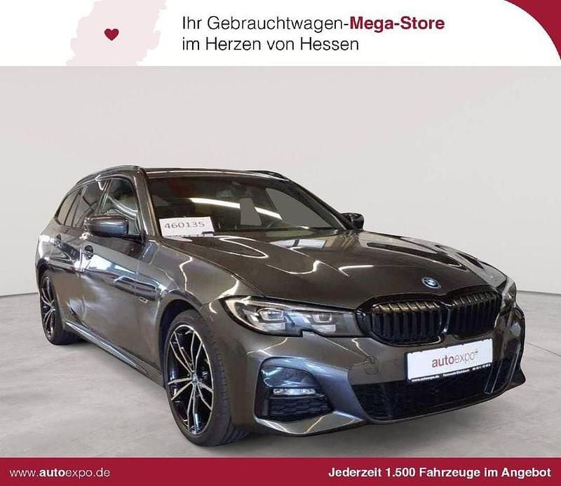 Mineralgrau metallic Gebraucht 2021 BMW 320e M Sport Kombi | 25.390 € (Guter Preis) - Bild 1/4