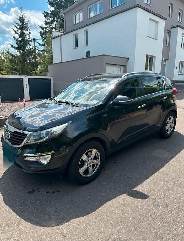 Schwarz Gebraucht 2013 Kia Sportage Platinum Edition SUV | 10.800 € (Fairer Preis) - Bild 1/4