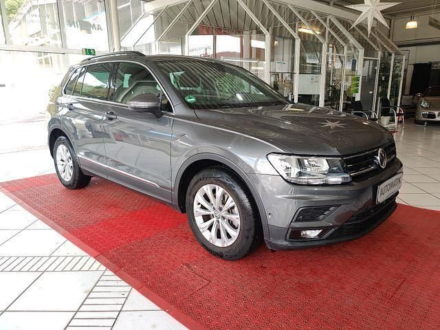 Indiumgrau metallic Gebraucht 2017 VW Tiguan Comfortline SUV | 18.800 € (Fairer Preis) - Bild 1/4