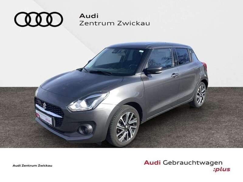 Grau Gebraucht 2021 Suzuki Swift Comfort+ Limousine | 13.860 € (Fairer Preis) - Bild 1/4