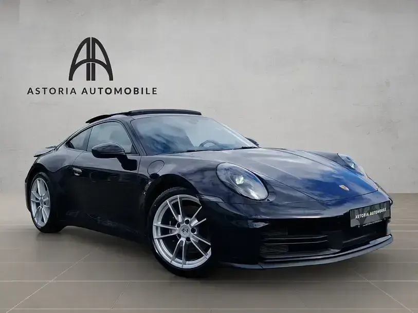 Gebraucht Porsche 911 Carrera 394 PS (289 kW) 2025 Tiefschwarz Coupé