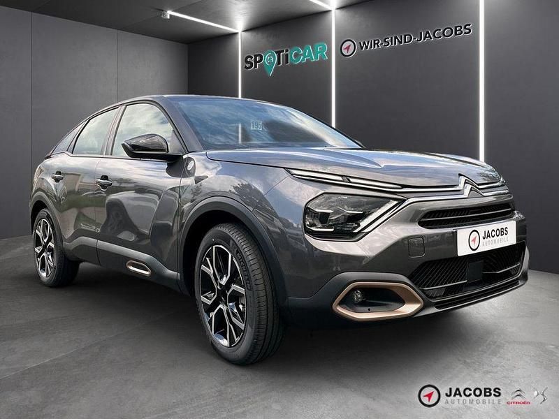 Gebraucht Citroën e-C4 100 kW (136 PS) 2023 Platiniumgrau (metallic) Limousine