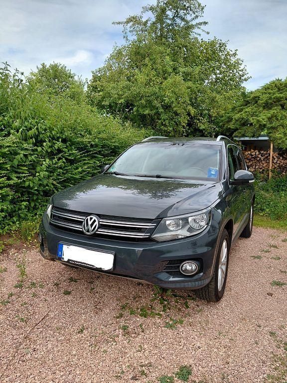 Grau Gebraucht 2014 VW Tiguan SUV | 12.900 € (Fairer Preis) - Bild 1/4