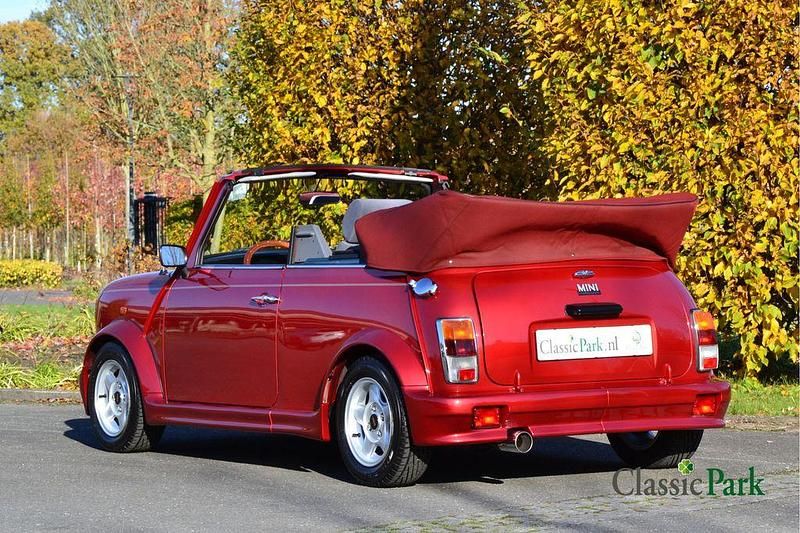 Gebraucht Rover Mini 63 PS (46 kW) 1995 Rot Cabrio