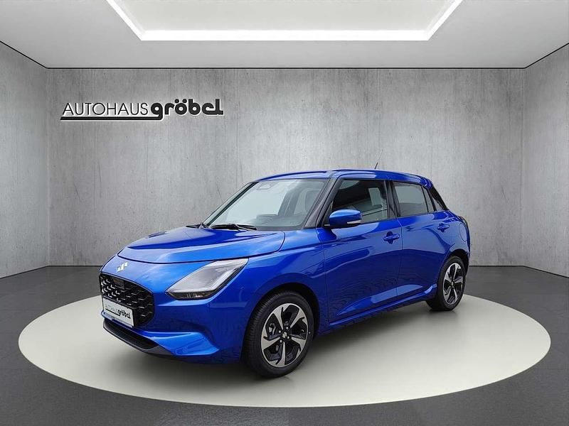 Blau Neu 2025 Suzuki Swift Comfort+ Kleinwagen | 21.990 € - Bild 1/4
