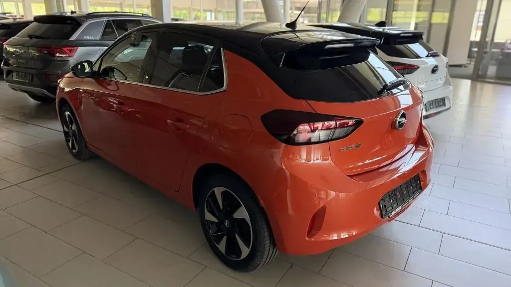 Gebraucht Opel Corsa-e Elegance 100 kW (136 PS) 2022 Orange Kleinwagen