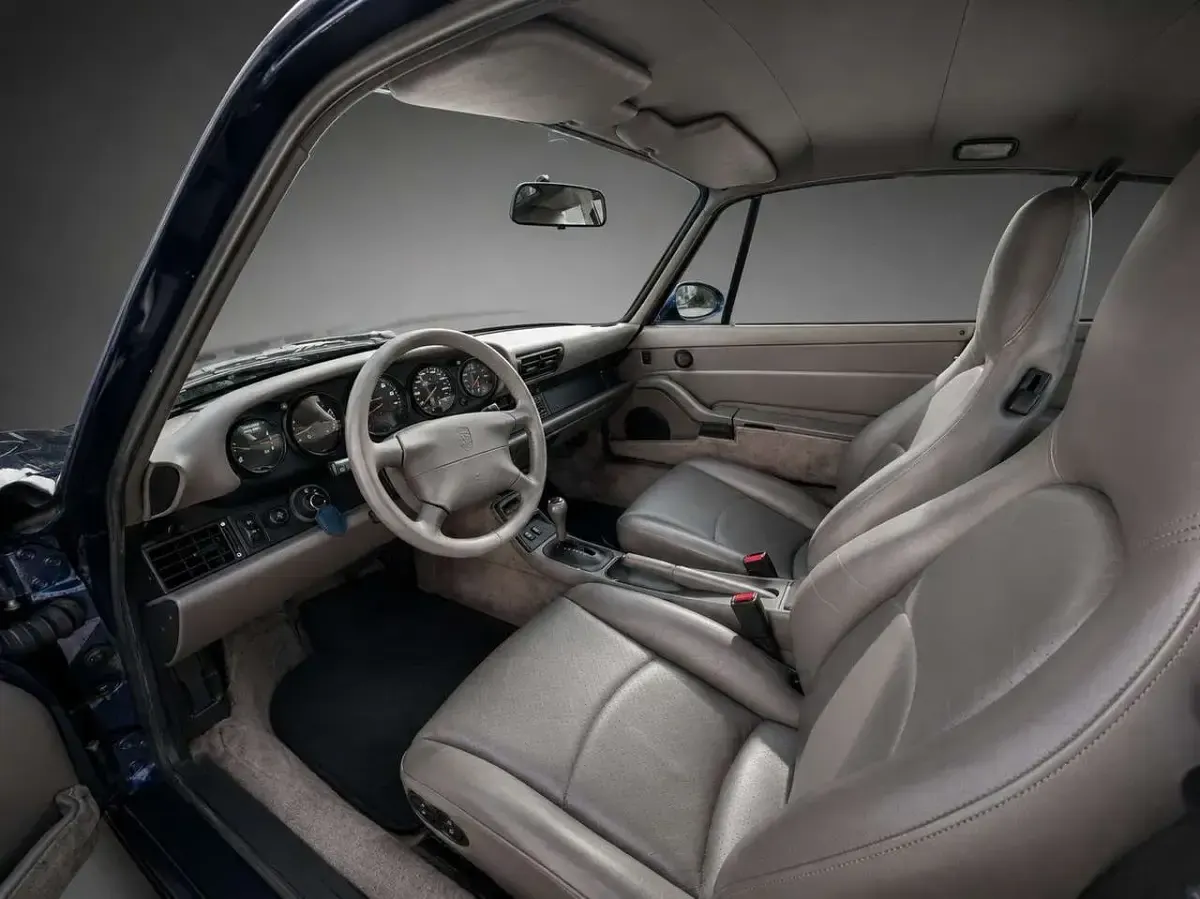 Gebraucht Porsche 911 Carrera 272 PS (200 kW) 1994 Irisblaumetallic Coupé