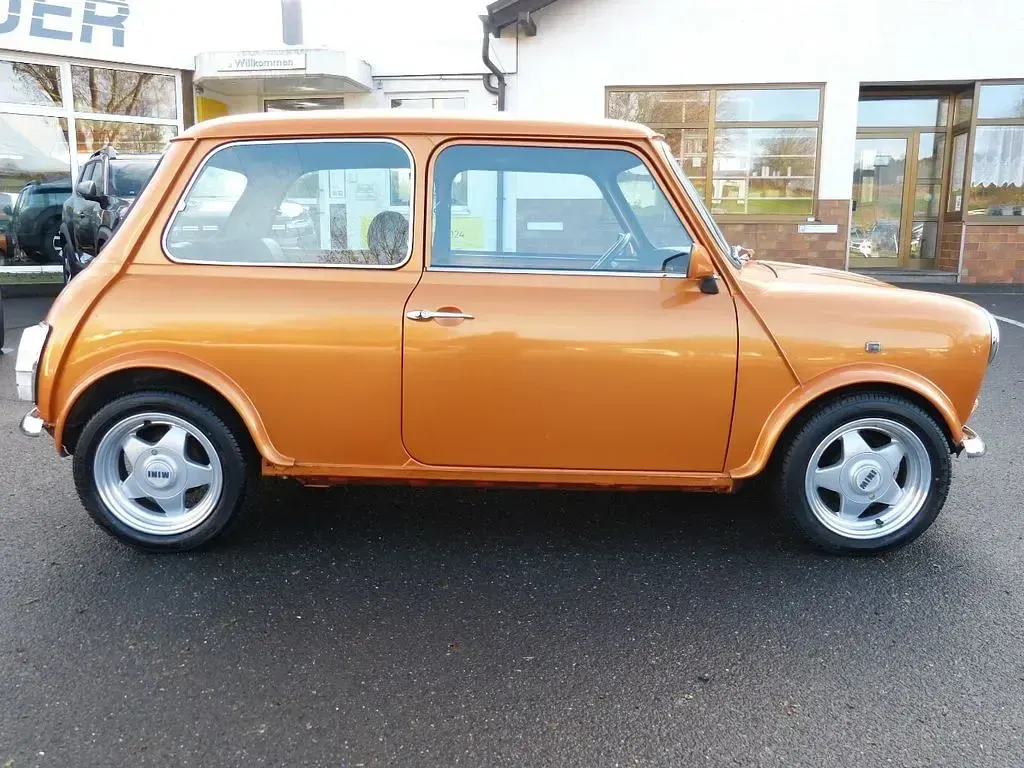 Używany Mini Cooper 63 KM (46 kW) 1995 Pomarańczowy Hatchback