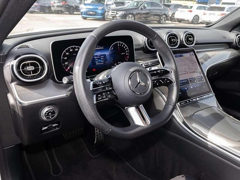 Gebraucht Mercedes C300e Business 313 PS (230 kW) 2023 Unilack polarweiß Kombi