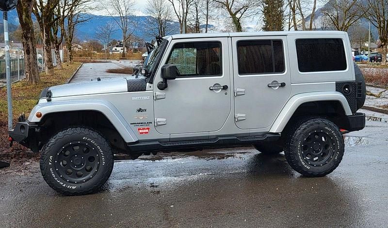 Silber Gebraucht 2012 Jeep Wrangler Unlimited Sahara SUV | 23.300 € (Guter Preis) - Bild 1/4