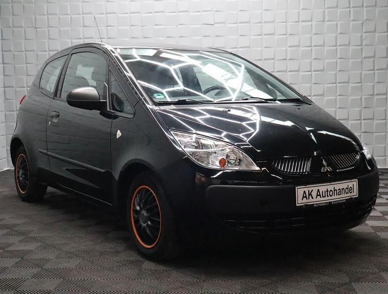 Gebraucht Mitsubishi Colt Inform 95 PS (69 kW) 2006 Cosmosschwarz Kleinwagen