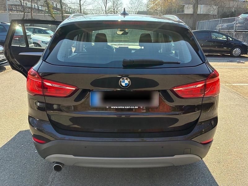 Używany BMW X1 Advantage 150 KM (110 kW) 2016 Brązowy SUV