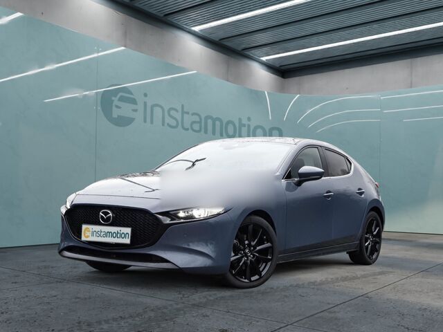 Grau Gebraucht 2023 Mazda 3 Selection Limousine | 28.477 € (Etwas zu teuer) - Bild 1/2