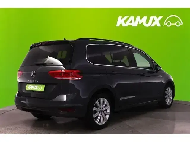 Second-hand VW Touran Highline 150 CP (110 kW) 2023 Gri Monovolum
