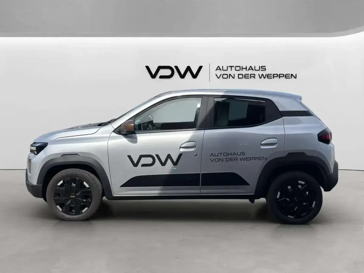 Gebraucht Dacia Spring Extreme 47 kW (65 PS) 2024 Diamantsilbergrau Kleinwagen