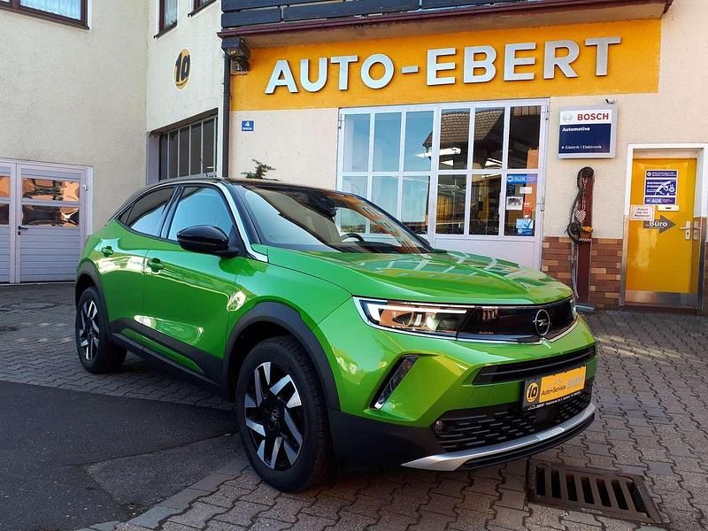 Gebraucht Opel Mokka Elegance 131 PS (96 kW) 2021 Matcha green (metallic) SUV