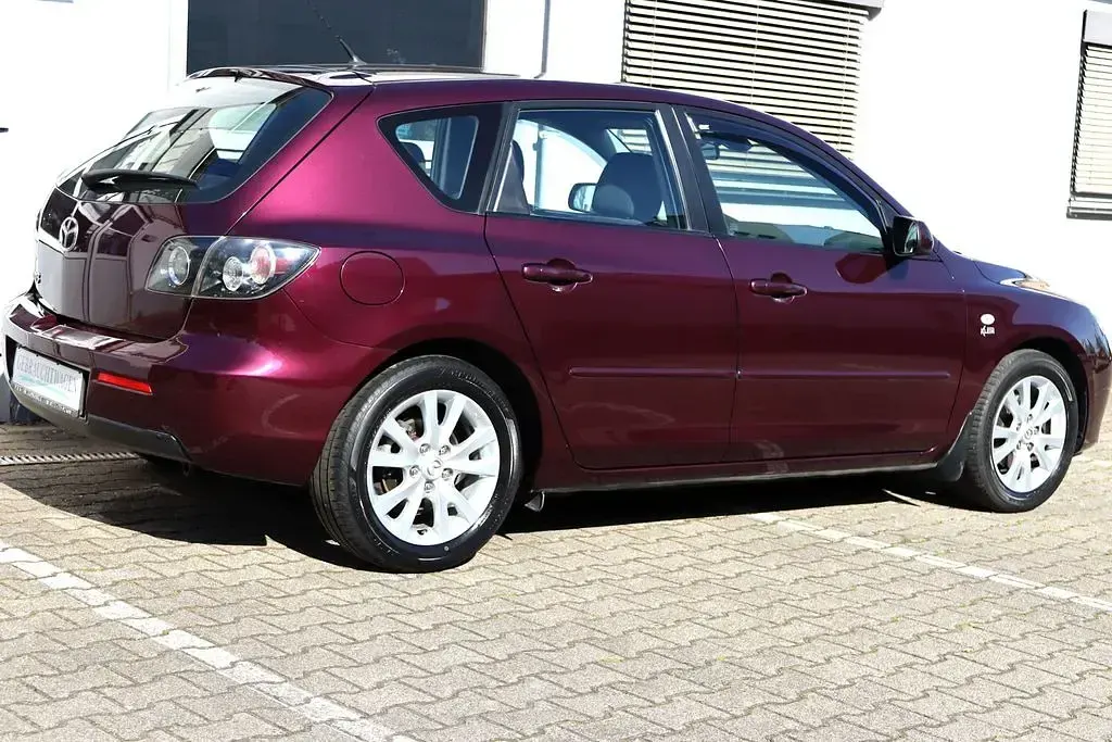 Używany Mazda 3 Active 105 KM (77 kW) 2007 Purpurowy Sedan/Limuzyna