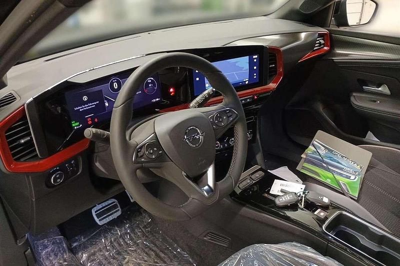 Gebraucht Opel Mokka-e 100 kW (136 PS) 2023 Schwarz karbon schwarz met. SUV