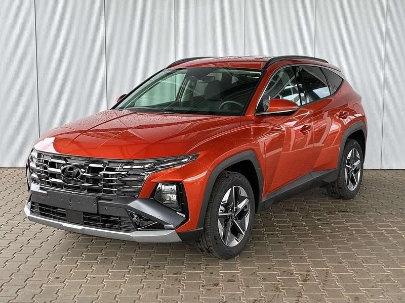 Jupiter orange Neu 2025 Hyundai Tucson GO! SUV | 33.100 € (Superpreis) - Bild 1/4