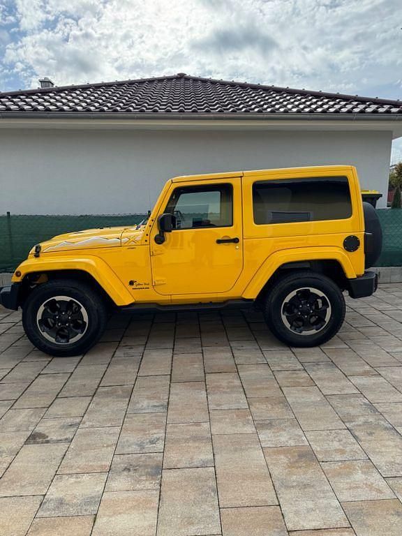 Gelb Gebraucht 2015 Jeep Wrangler SUV | 37.400 € (Etwas zu teuer) - Bild 1/4