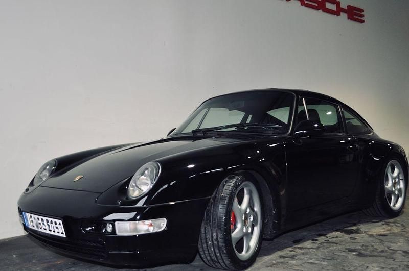 Schwarz Gebraucht 1996 Porsche 911 Carrera 4 Coupé | 98.000 € - Bild 1/4