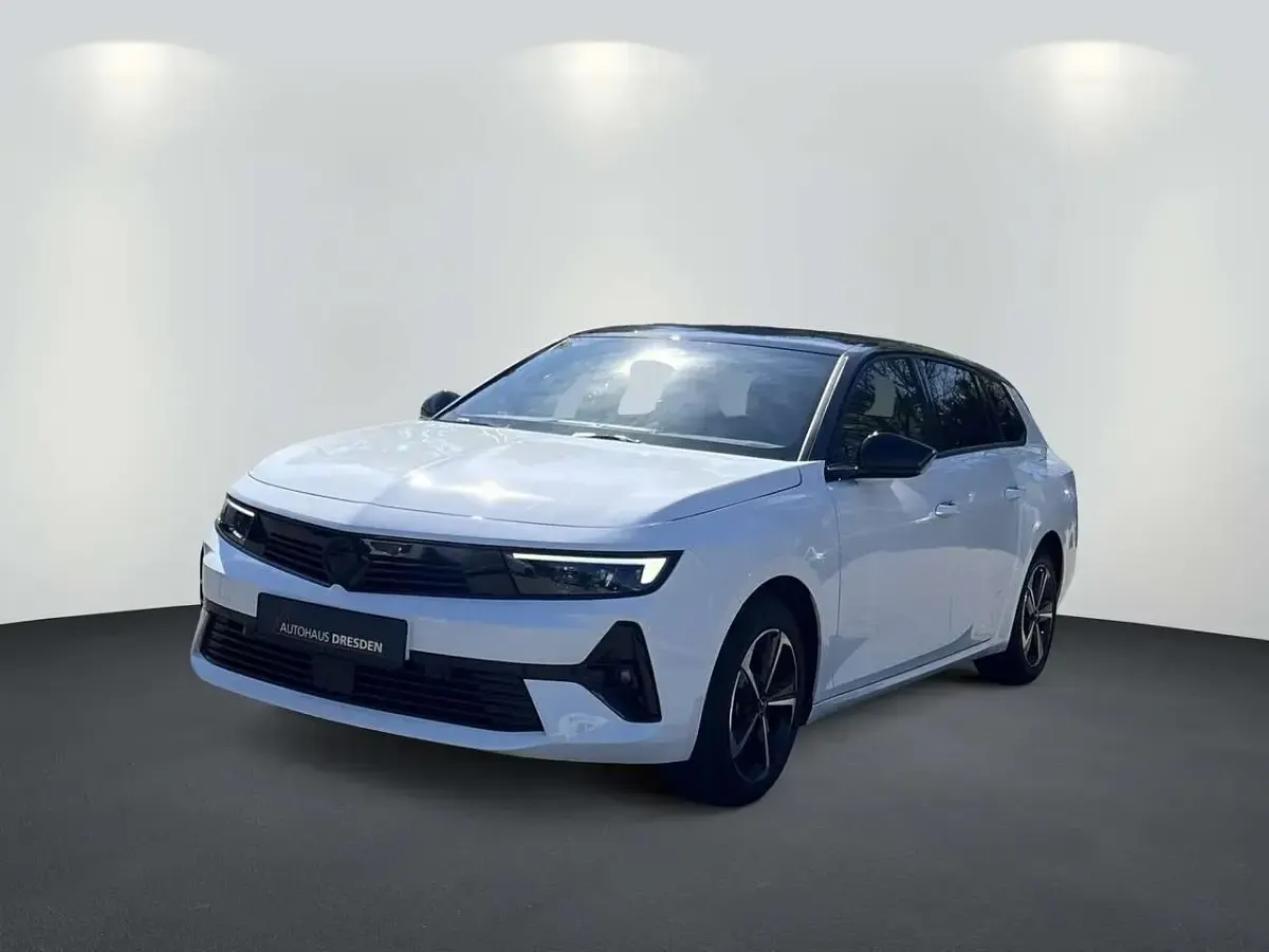 Gebraucht Opel Astra 131 PS (96 kW) 2024 Lack weiss banquise/typ aussenverkleidun Kombi