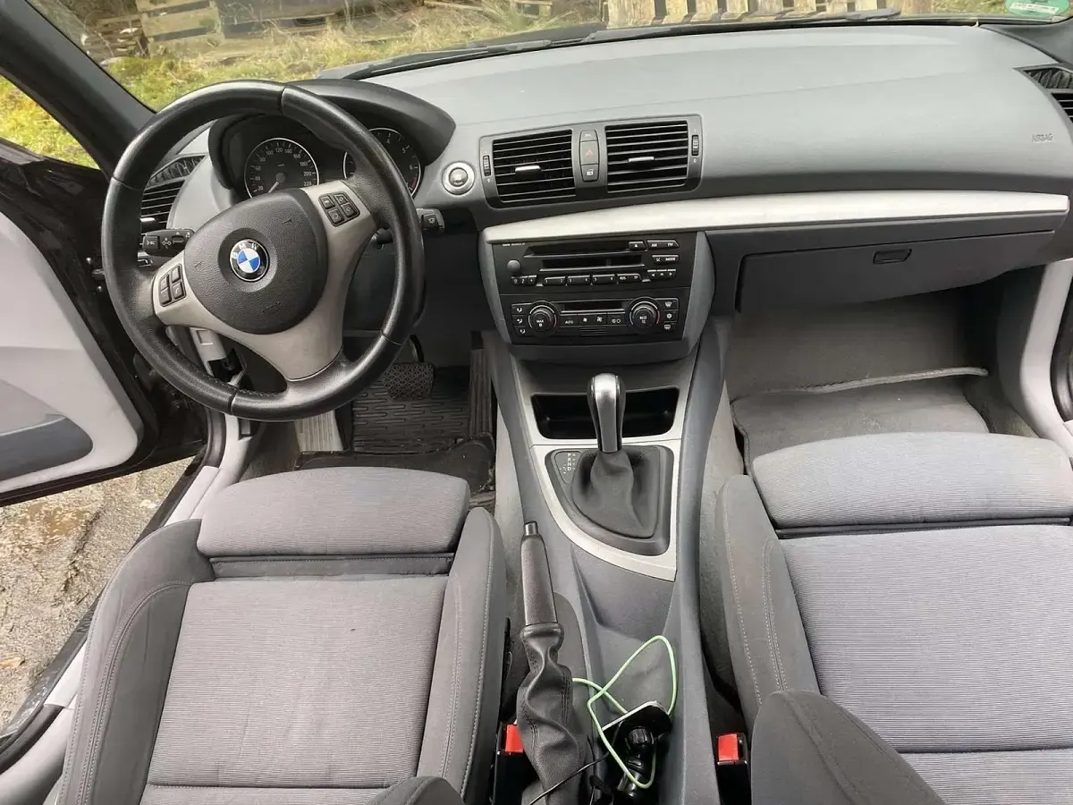 Gebraucht BMW 116 129 PS (94 kW) 2006 Schwarz Kleinwagen