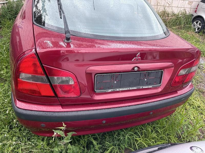 Violet Gebraucht 2000 Mitsubishi Carisma Limousine | 1.890 € - Bild 1/3