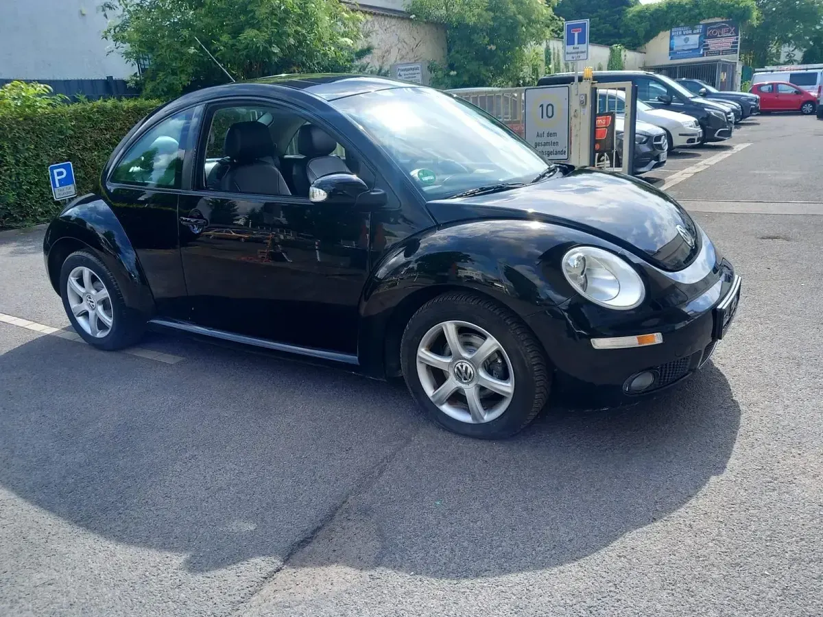 Gebraucht VW New Beetle 115 PS (84 kW) 2006 Schwarz Kleinwagen