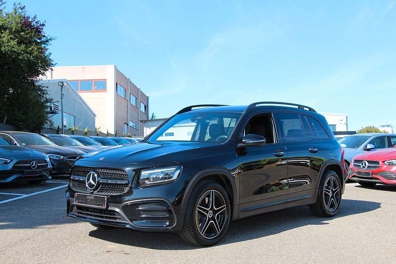 Schwarz Gebraucht 2024 Mercedes GLB250 AMG Line Premium SUV | 49.590 € (Fairer Preis) - Bild 1/4
