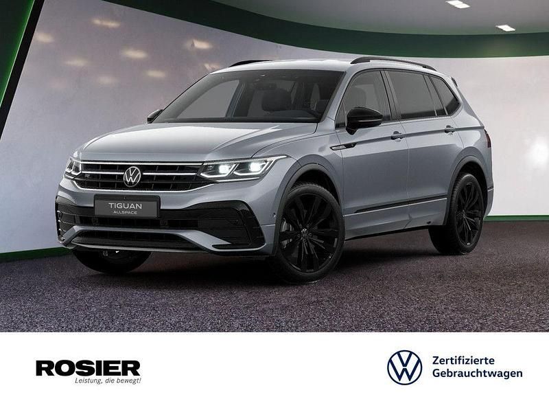Grau / platinum grey Gebraucht 2024 VW Tiguan Allspace R-line SUV | 48.660 € (Teuer) - Bild 1/4
