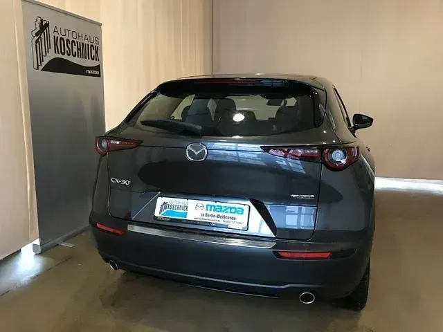 Gebraucht Mazda CX-30 Exclusive-Line 122 PS (89 kW) 2024 Machine gray SUV