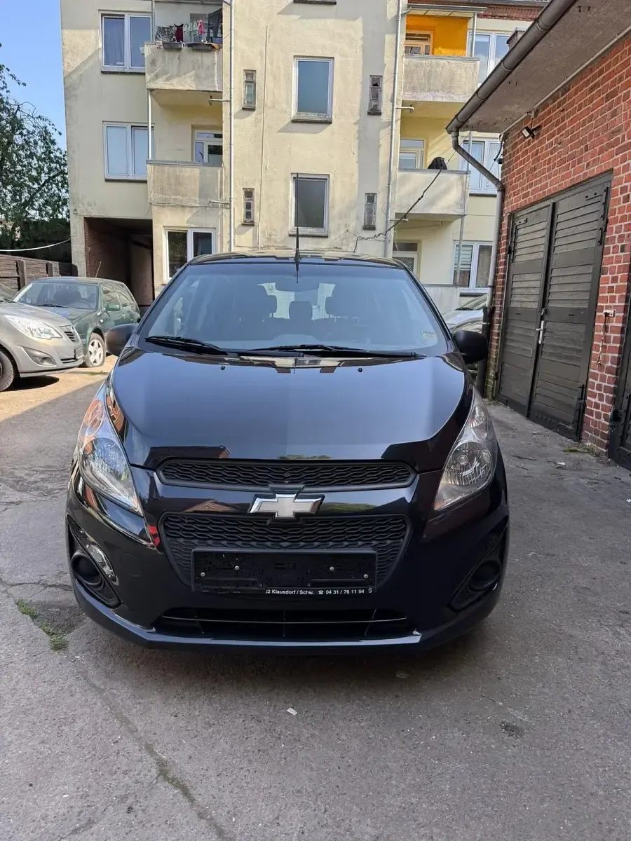 Gebraucht Chevrolet Spark 68 PS (50 kW) 2014 Schwarz Kleinwagen
