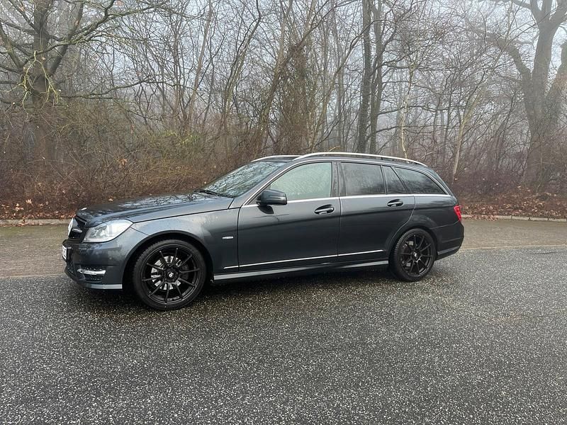 Schwarz Gebraucht 2011 Mercedes C250 AMG line Kombi | 8.950 € (Fairer Preis) - Bild 1/4