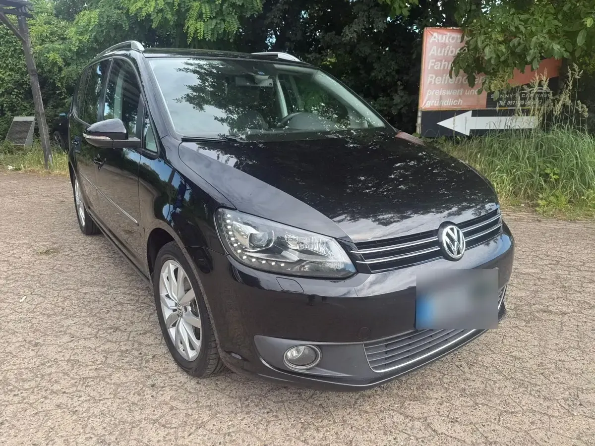 Gebraucht VW Touran 101 PS (74 kW) 2012 Schwarz Van / Kleinbus