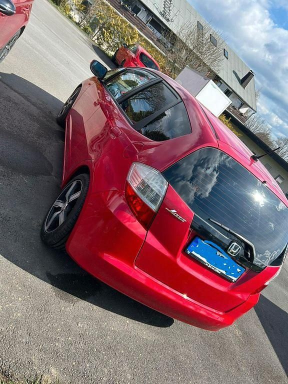 Second-hand Honda Jazz 90 CP (66 kW) 2011 Roșu Hatchback